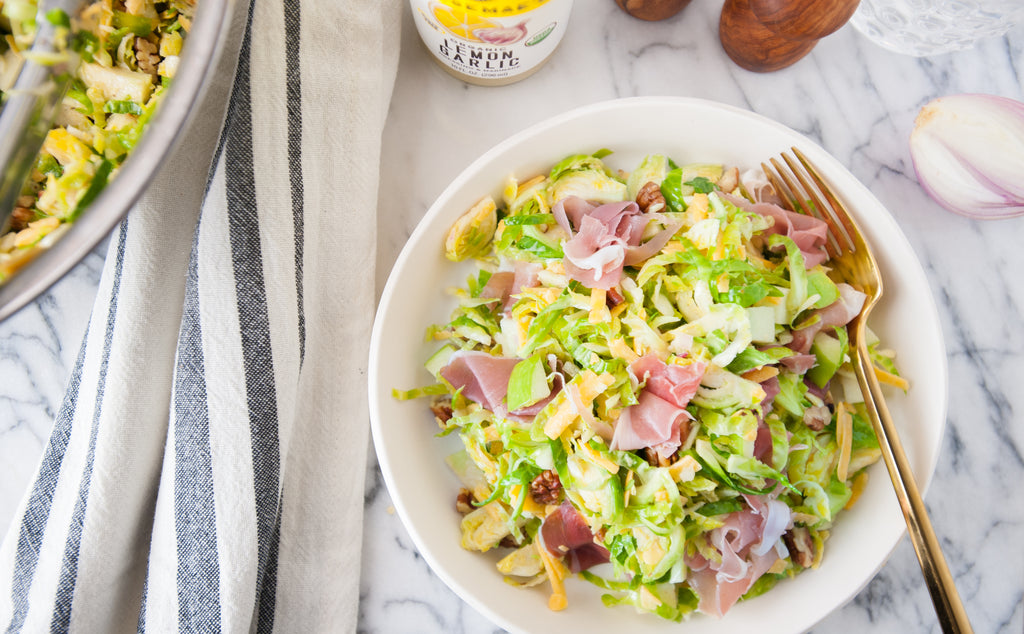 Brussels Sprout Salad with Cheddar, Prosciutto & Pecans