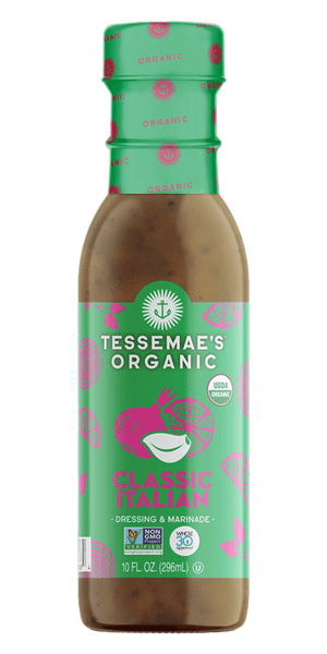 Bottle of Tessemae's Organic Classic Italian dressing with green label and red polka dot cap